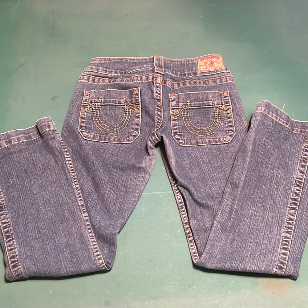 True Religion Jeans WM size W28/L28 about a 7” low rise 14” across the waist